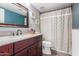 Clean bathroom with a granite countertop and shower at 7752 W Mary Jane Ln, Peoria, AZ 85382