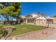 Beautiful two-story home with a large front yard at 7752 W Mary Jane Ln, Peoria, AZ 85382
