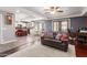 Open floor plan boasts a spacious kitchen and Gathering room, perfect for entertaining at 7752 W Mary Jane Ln, Peoria, AZ 85382