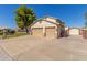 Two-car garage and manicured lawn at 7752 W Mary Jane Ln, Peoria, AZ 85382