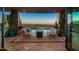 Covered patio with stunning sunset views and comfortable seating at 9719 E Madera Dr, Scottsdale, AZ 85262