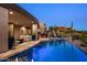 Luxury pool and spa with outdoor seating and sunset views at 9719 E Madera Dr, Scottsdale, AZ 85262