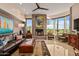 Spacious living room with fireplace and large windows offering scenic views at 9719 E Madera Dr, Scottsdale, AZ 85262