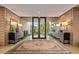 Bright entryway with large glass doors and ornate rug at 9719 E Madera Dr, Scottsdale, AZ 85262