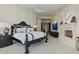 Elegant main bedroom with fireplace and ample space at 9719 E Madera Dr, Scottsdale, AZ 85262