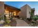 Exterior of luxury home with desert landscaping and walkway at 9719 E Madera Dr, Scottsdale, AZ 85262