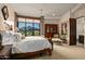 Bright bedroom with mountain views and a comfortable king-size bed at 9719 E Madera Dr, Scottsdale, AZ 85262