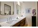 Double vanity bathroom with marble countertops and modern fixtures at 9719 E Madera Dr, Scottsdale, AZ 85262