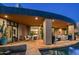 Large covered patio perfect for entertaining with multiple seating areas at 9719 E Madera Dr, Scottsdale, AZ 85262