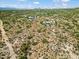 Aerial view of vacant land with surrounding desert landscape and distant mountain views at 0 E Red Bird Rd, Scottsdale, AZ 85262