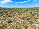 Aerial view showing vacant land with nearby custom homes and desert landscape at 0 E Red Bird Rd, Scottsdale, AZ 85262