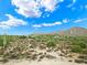 Aerial view of vacant land with desert landscape and mountain backdrop at 0 E Red Bird Rd, Scottsdale, AZ 85262
