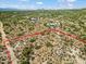 Aerial view of vacant land with surrounding desert landscape and distant mountain views at 0 E Red Bird Rd, Scottsdale, AZ 85262