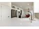 Modern kitchen featuring white cabinets, quartz countertops and a large island at 23817 S Harmony Way, Sun Lakes, AZ 85248