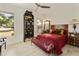 Bedroom with large windows, hardwood floors, and antique furniture at 23817 S Harmony Way, Sun Lakes, AZ 85248