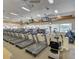 Well-equipped fitness center with treadmills and TVs at 23817 S Harmony Way, Sun Lakes, AZ 85248