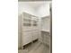 Spacious closet with built-in shelves and drawers at 23817 S Harmony Way, Sun Lakes, AZ 85248