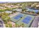 Community tennis courts with surrounding landscape at 23817 S Harmony Way, Sun Lakes, AZ 85248