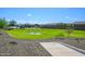 Community park with grassy area and playground at 12568 W Orangewood Ave, Glendale, AZ 85307