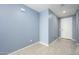 Bright and airy entryway with tile flooring and neutral-toned walls at 12568 W Orangewood Ave, Glendale, AZ 85307