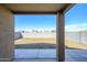 Backyard view with gravel and block wall at 12568 W Orangewood Ave, Glendale, AZ 85307