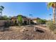 Single story home with desert landscaping at 10650 N 49Th Ave, Glendale, AZ 85304