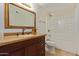 Bathroom with vanity, bathtub, and tiled flooring at 10650 N 49Th Ave, Glendale, AZ 85304