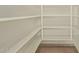 Well-lit pantry with ample shelving for storage at 10650 N 49Th Ave, Glendale, AZ 85304