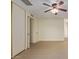 Bedroom with tile flooring and door to hallway at 10650 N 49Th Ave, Glendale, AZ 85304