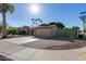 Ranch style home with large driveway and gate at 10650 N 49Th Ave, Glendale, AZ 85304