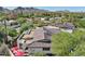 Aerial view of home showcasing roofline and mountain backdrop at 3007 E Calaveros Dr, Phoenix, AZ 85028