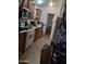 Bright kitchen with ample cabinetry and tile flooring at 7300 N 51St Ave # F 99, Glendale, AZ 85301