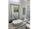 Bathroom with single vanity and decorative art at 20216 W Desert Bloom St, Buckeye, AZ 85326