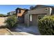 Backyard with patio and desert landscaping at 20216 W Desert Bloom St, Buckeye, AZ 85326