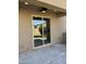 Covered patio with sliding glass doors at 20216 W Desert Bloom St, Buckeye, AZ 85326