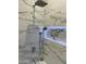 Modern shower with marble tile and LED lighting at 20216 W Desert Bloom St, Buckeye, AZ 85326