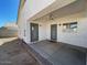 Covered patio with ceiling fan and double doors at 2667 S 156Th Ave, Goodyear, AZ 85338