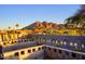 Landscaped yard with mountain views and a modern block wall at 6529 N Mountain View Dr, Paradise Valley, AZ 85253