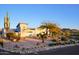 Landscaped front yard with desert plants and mountain backdrop at 6529 N Mountain View Dr, Paradise Valley, AZ 85253