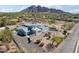 Aerial view of house with pool and mountain backdrop at 6529 N Mountain View Dr, Paradise Valley, AZ 85253