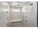 Multi-head shower with built-in seat and modern fixtures at 6529 N Mountain View Dr, Paradise Valley, AZ 85253