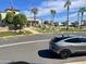 Landscaped community entrance with parking and building at 7750 E Broadway Rd # 761, Mesa, AZ 85208