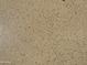Beige and brown speckled epoxy flooring in the garage at 7750 E Broadway Rd # 761, Mesa, AZ 85208