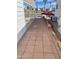 Sidewalk leading to the home's entrance with decorative brickwork at 7750 E Broadway Rd # 761, Mesa, AZ 85208