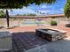 Community pool and fire pit area with patio and landscaping at 7750 E Broadway Rd # 761, Mesa, AZ 85208