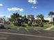 Carriage Manor Resort clubhouse with landscaping and parking at 7750 E Broadway Rd # 761, Mesa, AZ 85208