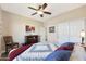 Guest bedroom with a queen-size bed and ample closet space at 16866 S 180Th Ave, Goodyear, AZ 85338