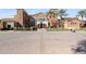 Exterior view of community clubhouse with inviting landscaping at 16866 S 180Th Ave, Goodyear, AZ 85338
