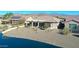 Single story home with backyard pond view at 16866 S 180Th Ave, Goodyear, AZ 85338