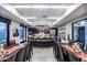 Large kitchen in community center with island and dining tables at 16866 S 180Th Ave, Goodyear, AZ 85338